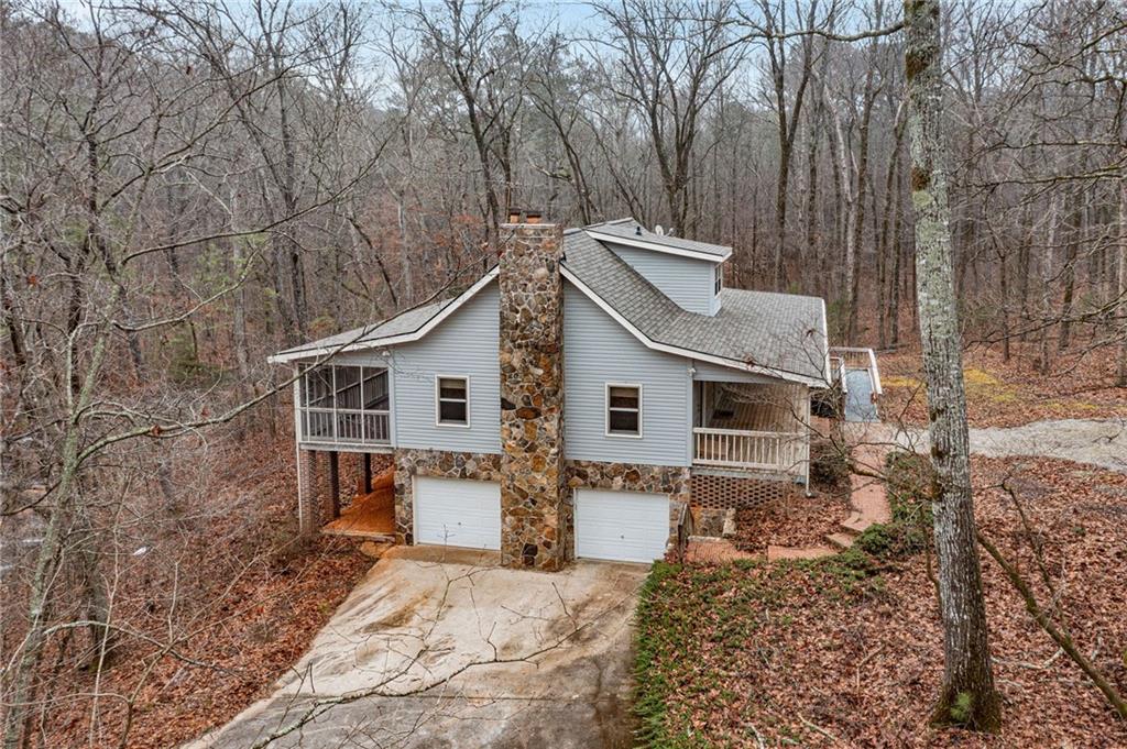 1012 King Mill Road McDonough, GA 30252 - Photo 58 of 64 a view of a house with a yard covered in snow