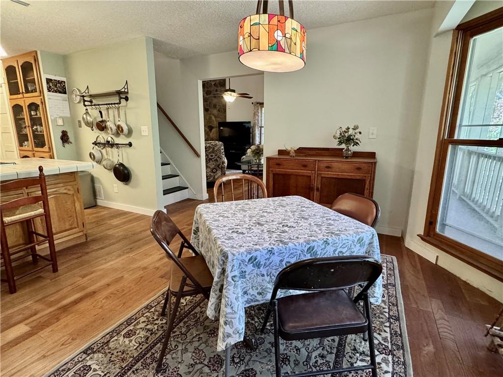 1012 King Mill Road McDonough, GA 30252 - Photo 9 of 64 a dining room with wooden floor and breakfast area