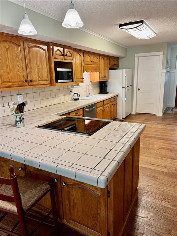1012 King Mill Road McDonough, GA 30252 - Photo 10 of 64 a kitchen with stainless steel appliances a sink a stove a refrigerator a counter top space and cabinets