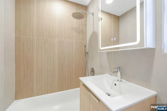 a bathroom with a sink and a bathtub