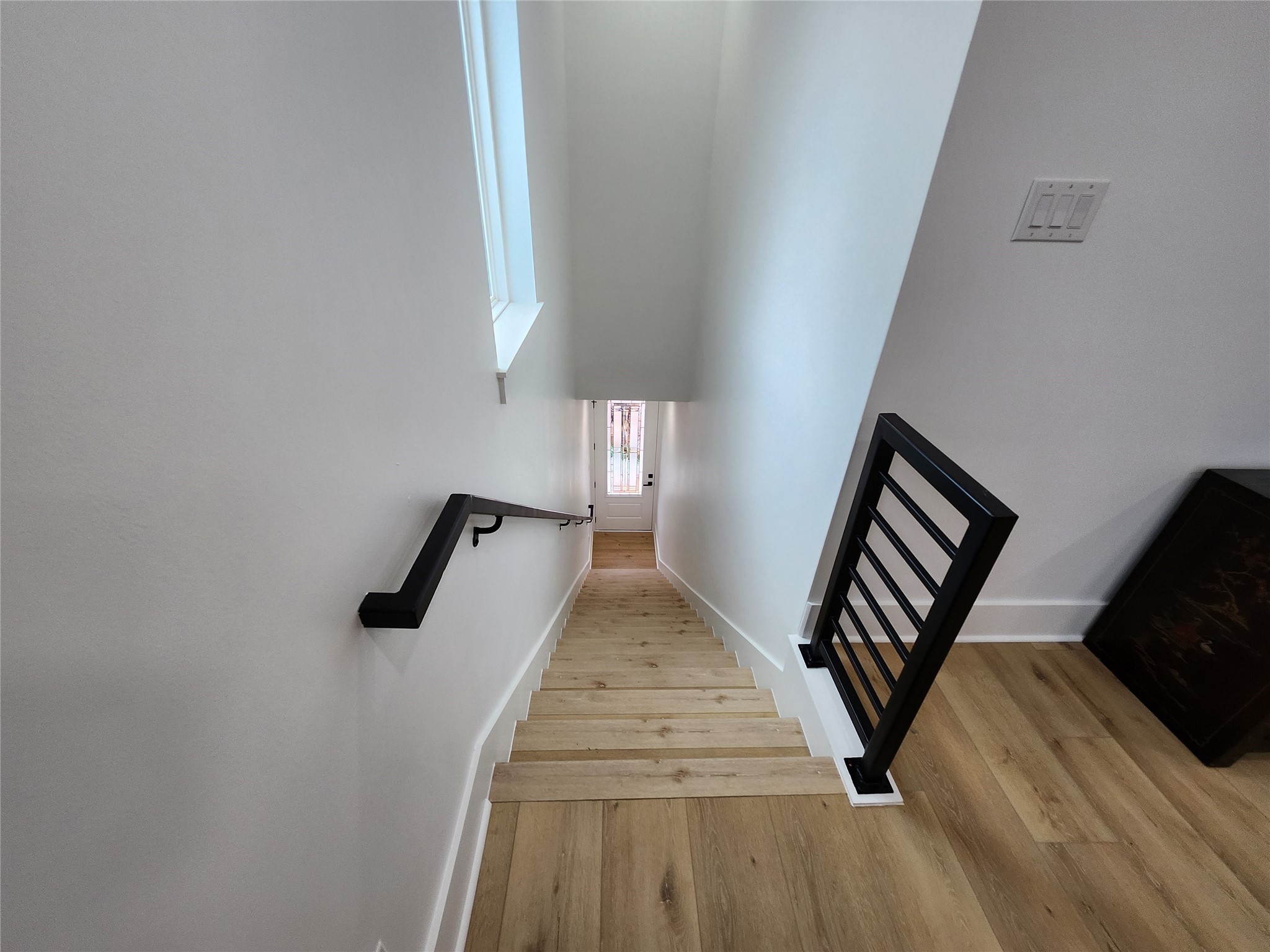 207 Carl Street Houston, TX 77009 - Photo 11 of 14 a view of entryway with wooden floor