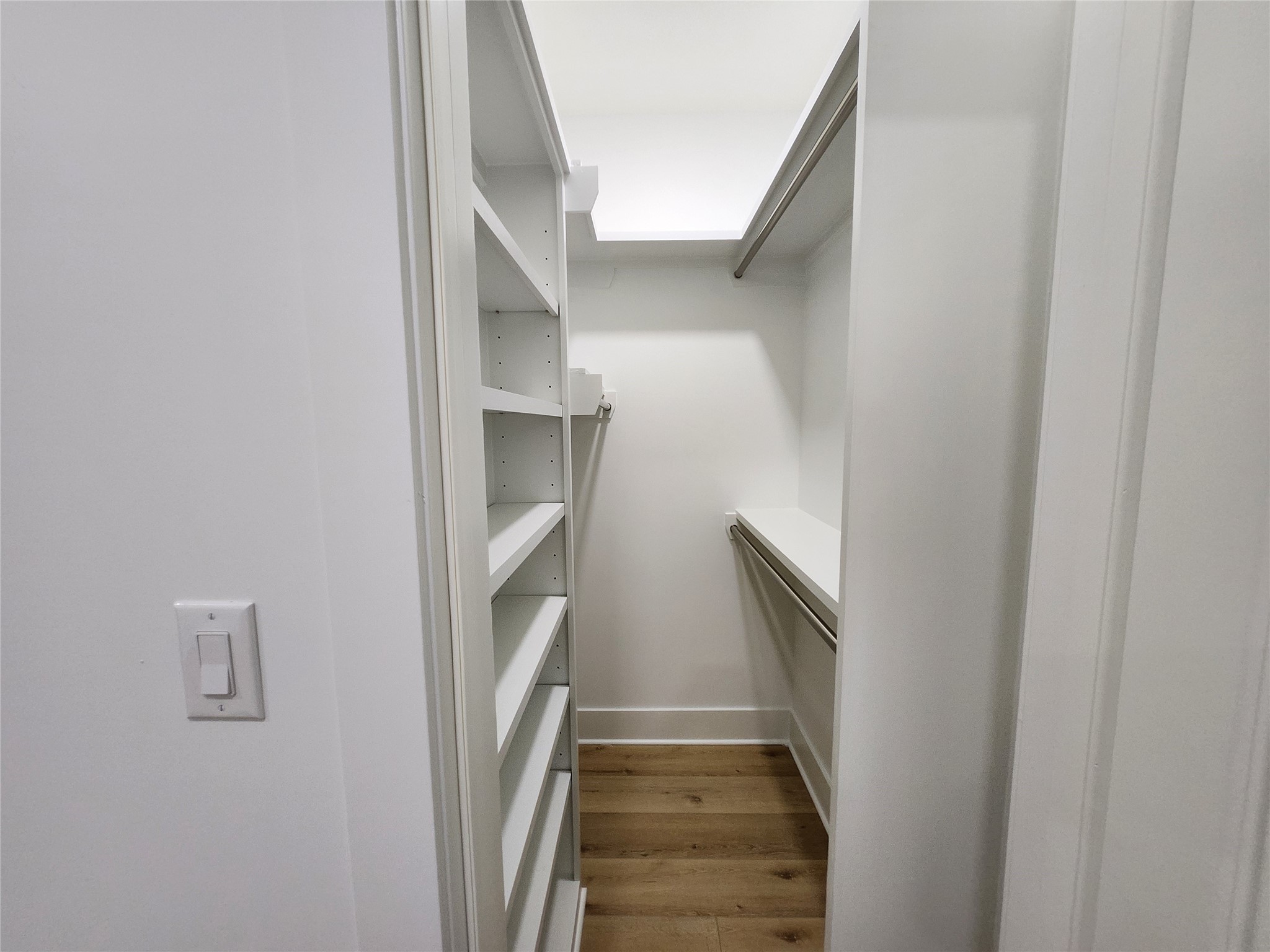 207 Carl Street Houston, TX 77009 - Photo 7 of 14 a view of staircase with white walls and door