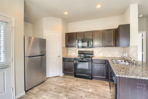 a view of livingroom with hardwood floor and window