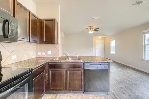 a view of a room with windows