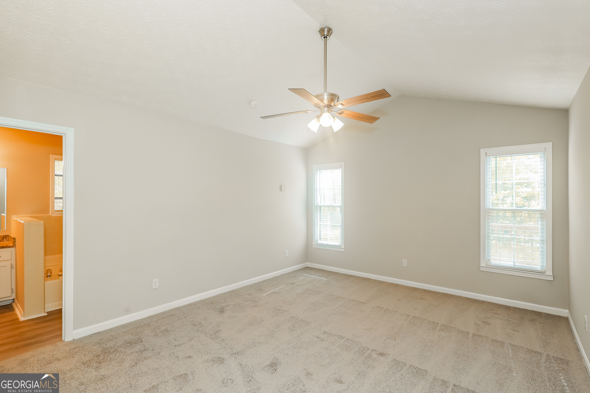 9183 Snipe Lane Jonesboro, GA 30236 - Photo 12 of 22 a view of an empty room with a window