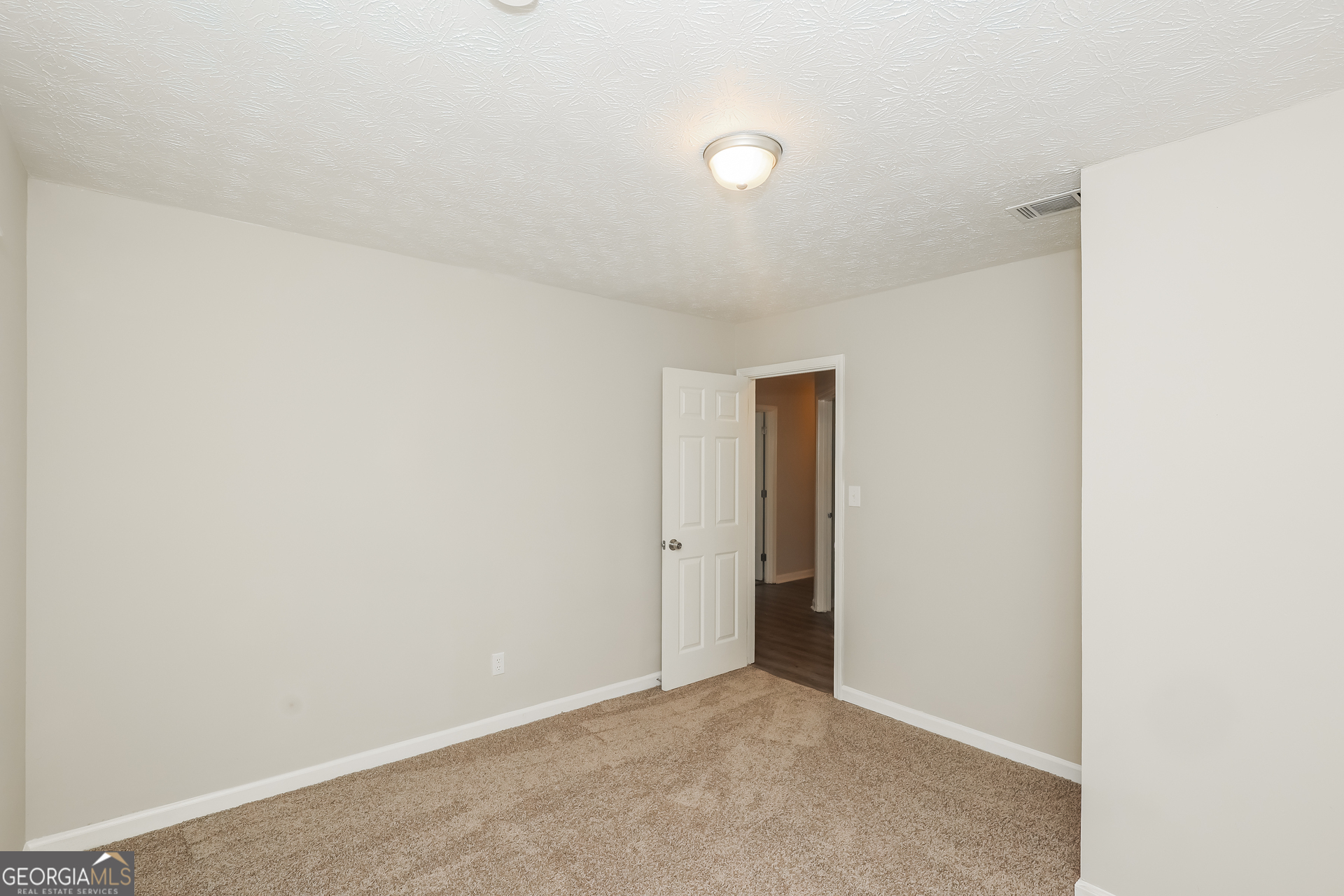 9183 Snipe Lane Jonesboro, GA 30236 - Photo 18 of 22 a view of an empty room