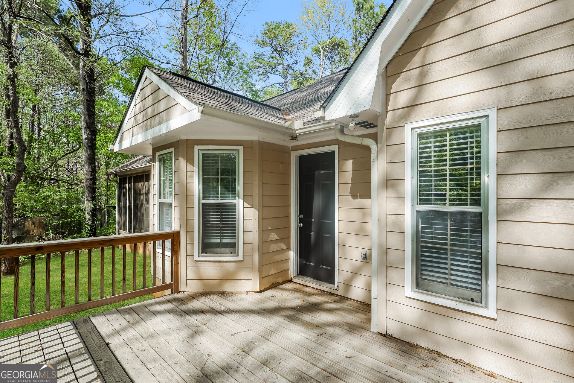 9183 Snipe Lane Jonesboro, GA 30236 - Photo 21 of 22 a view of a house with a porch