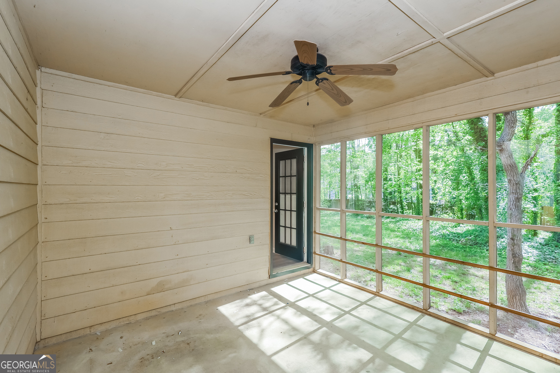 9183 Snipe Lane Jonesboro, GA 30236 - Photo 9 of 22 a view of empty room with window and ceiling fan