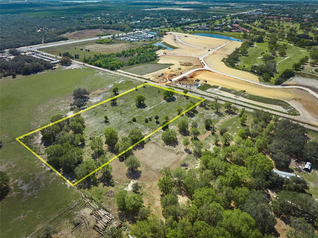 386 Capps Road Lake Wales, FL 33898 - Photo 10 of 13 a view of a lake with a yard