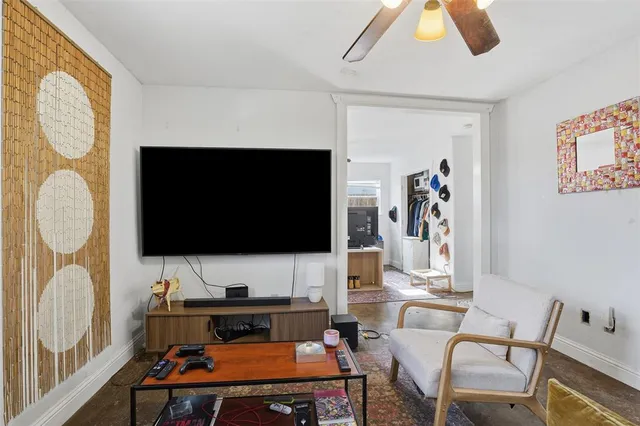 a kitchen with stainless steel appliances a stove and a refrigerator