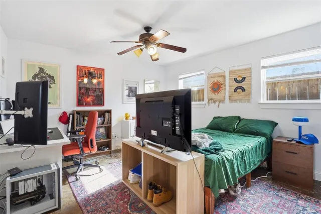 a bathroom with a sink a mirror and shower