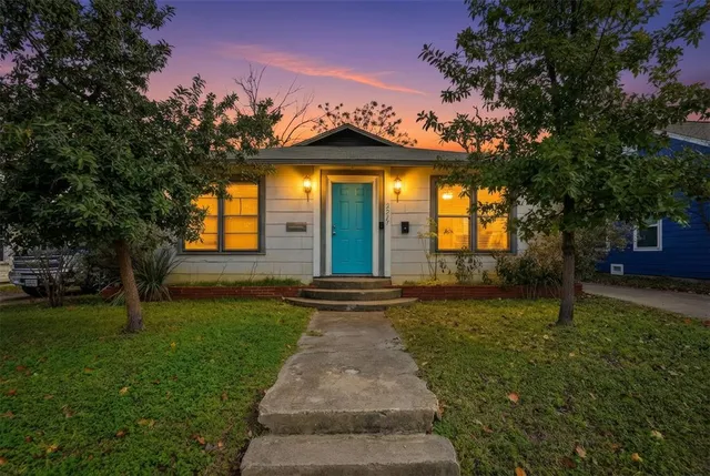 a house with trees in front of it