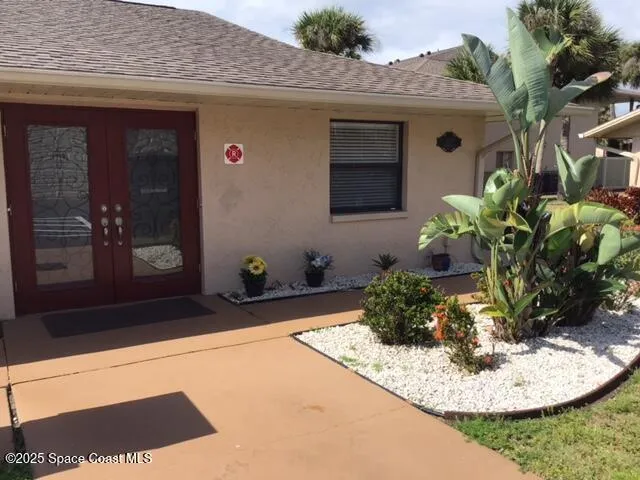 a vase of flowers sitting on a table