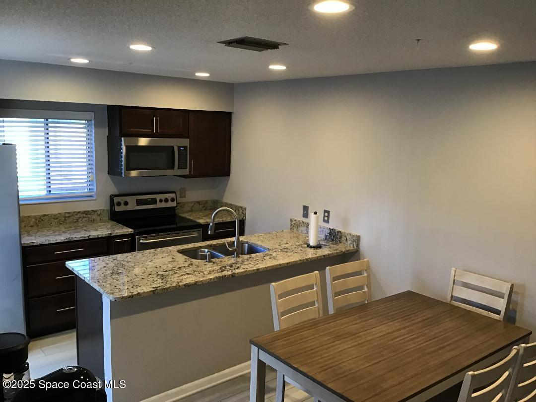 4106 Stock Avenue, Unit 404 Rockledge, FL 32955 - Photo 4 of 30 cwvkitchen