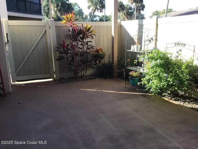 a view of a house with a street