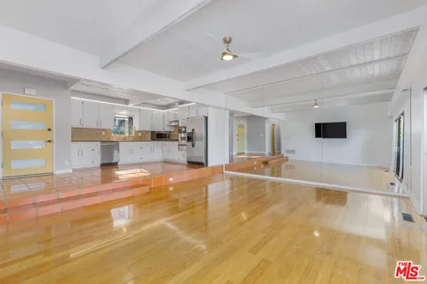 a view of a living room kitchen