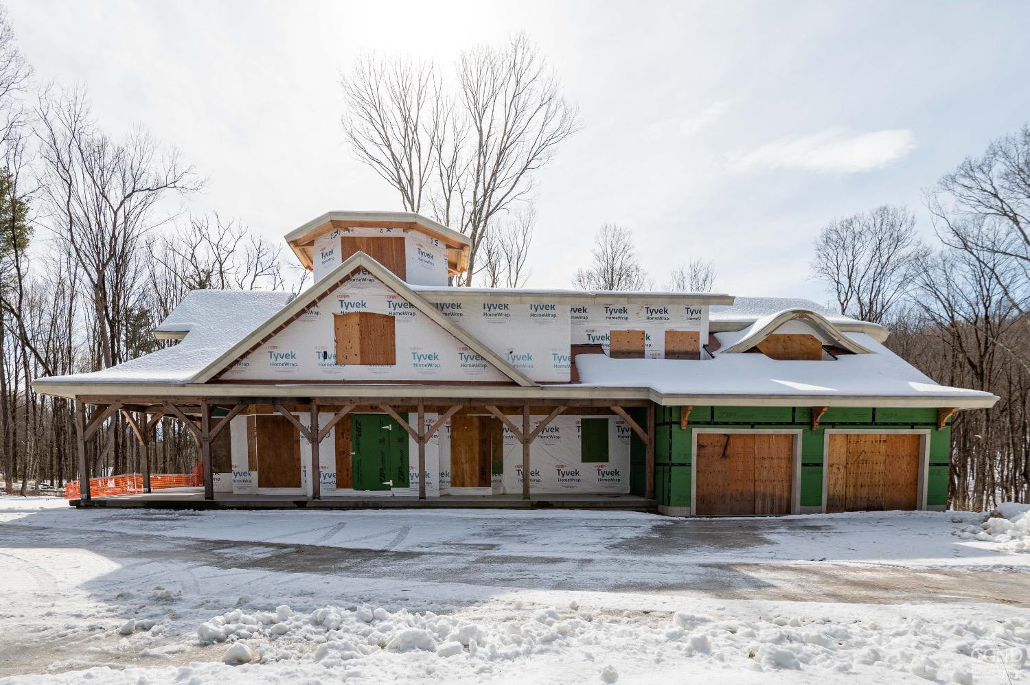 67 Blunt Road Great Barrington, MA 01230 - Photo 1 of 11 a front view of a house with garden