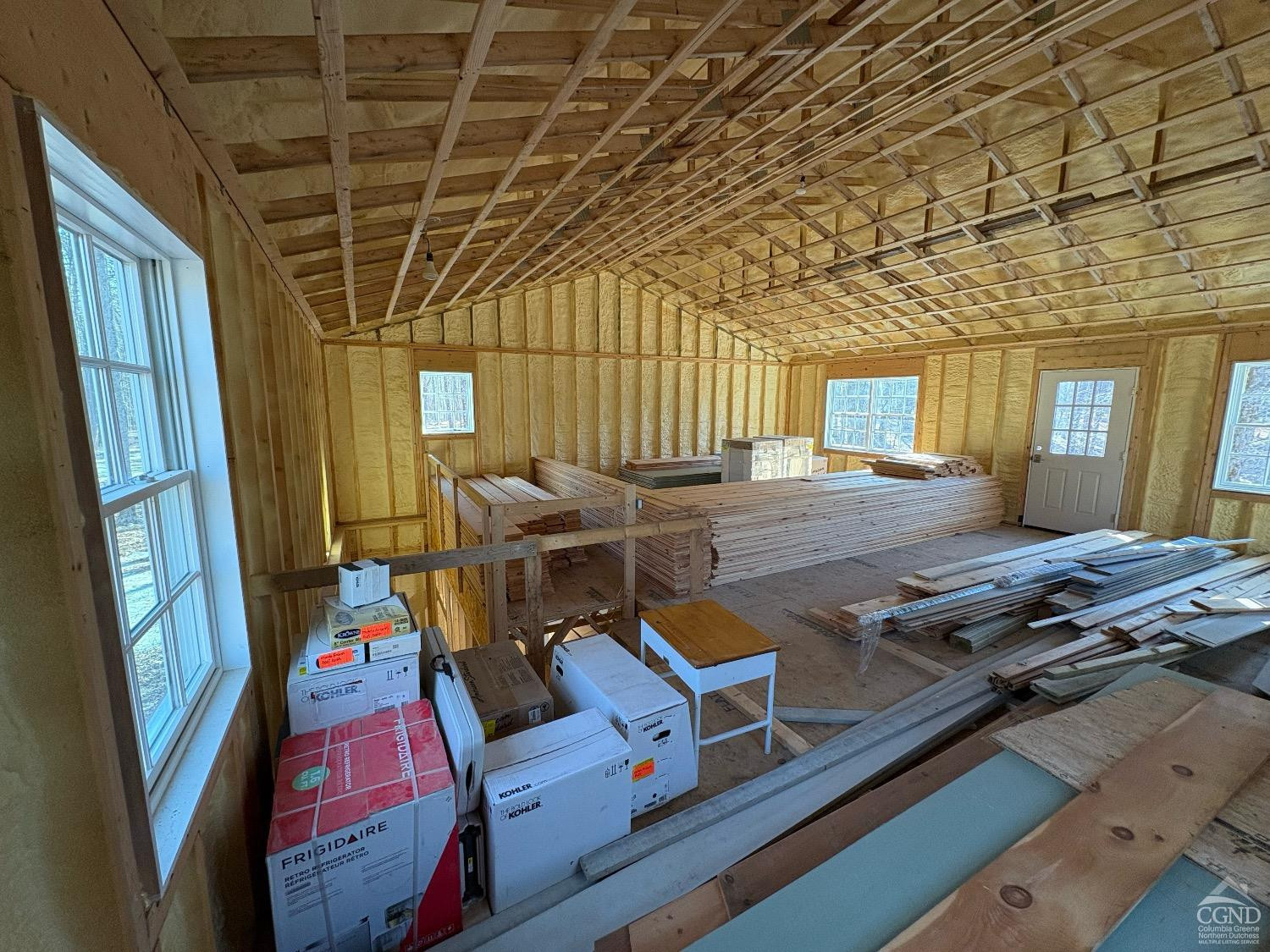 67 Blunt Road Great Barrington, MA 01230 - Photo 11 of 11 a room with furniture and a flat screen tv