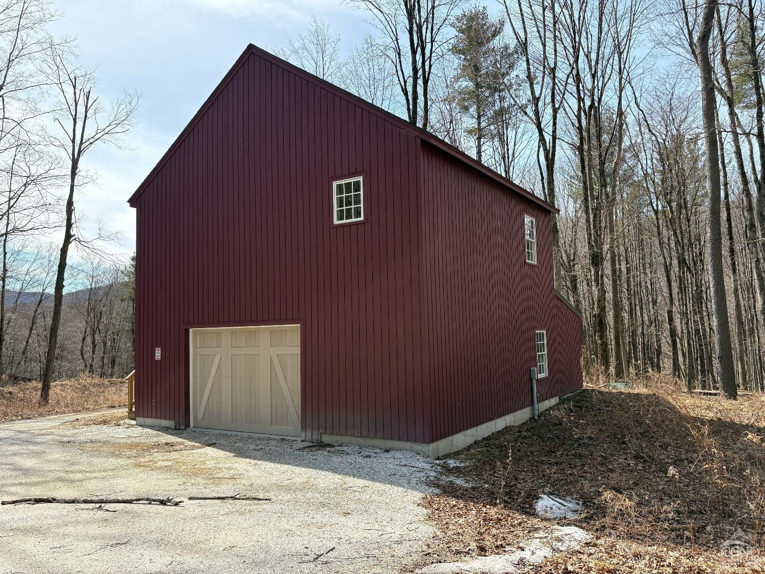 67 Blunt Road Great Barrington, MA 01230 - Photo 9 of 11 a backyard of a house with a tree and wooden fence