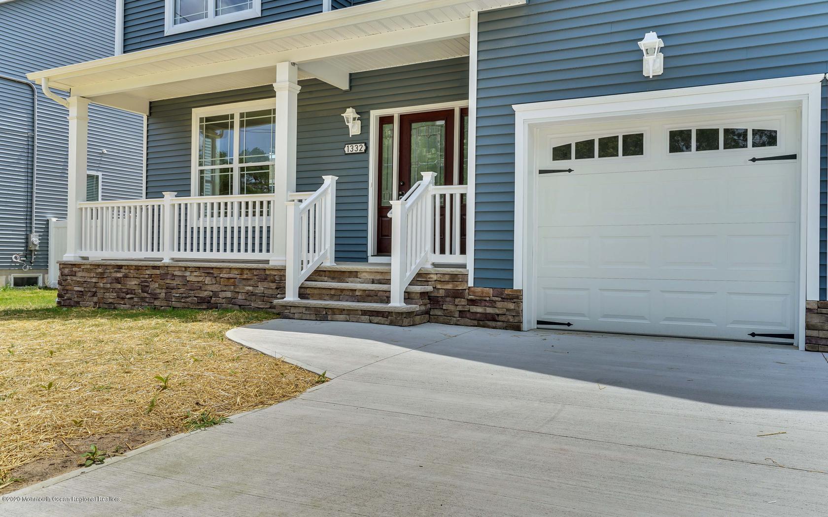 615 Ivanhoe Road Brick, NJ 08723 - Photo 2 of 28 a front view of a house with a yard