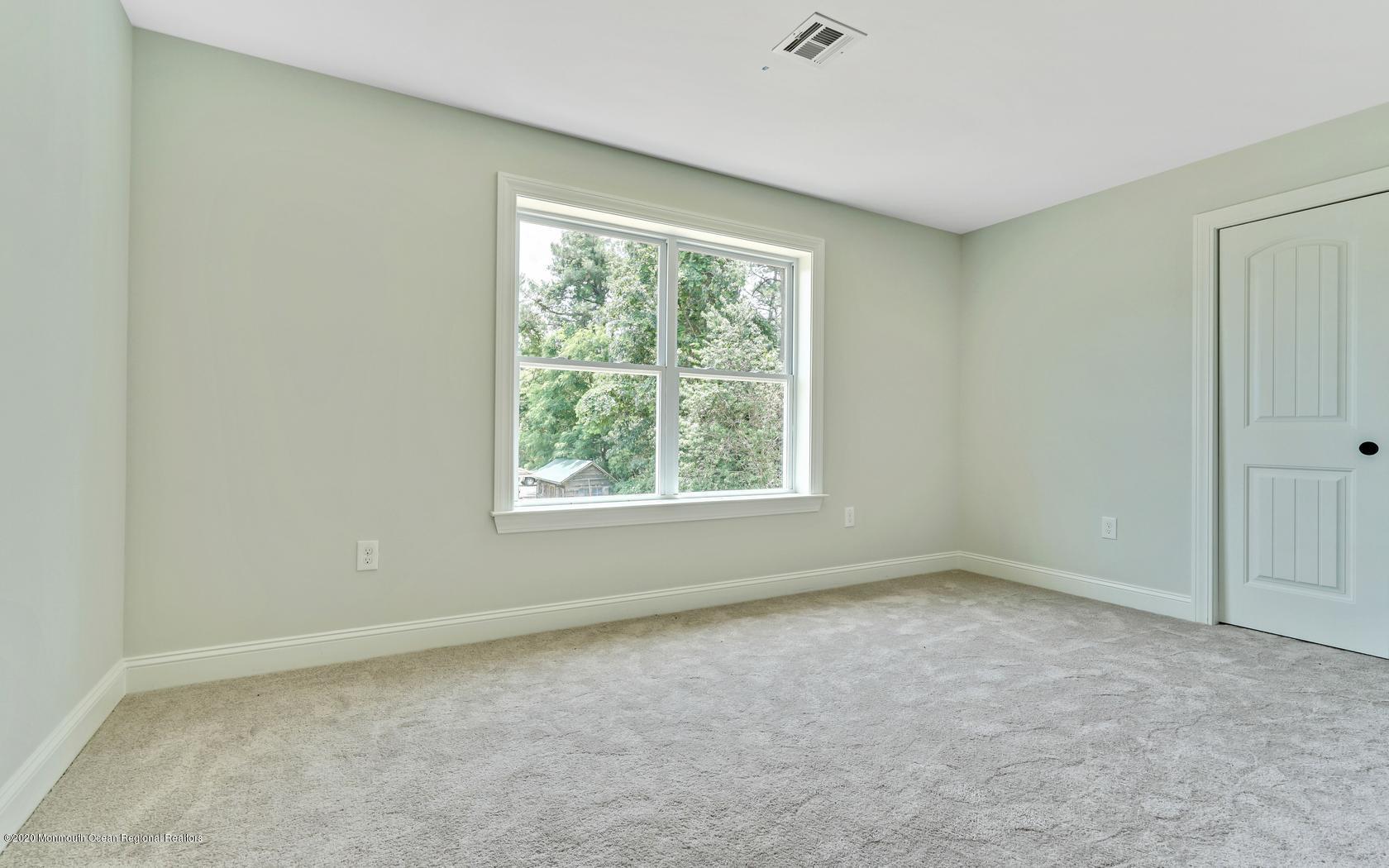 615 Ivanhoe Road Brick, NJ 08723 - Photo 22 of 28 an empty room with a window