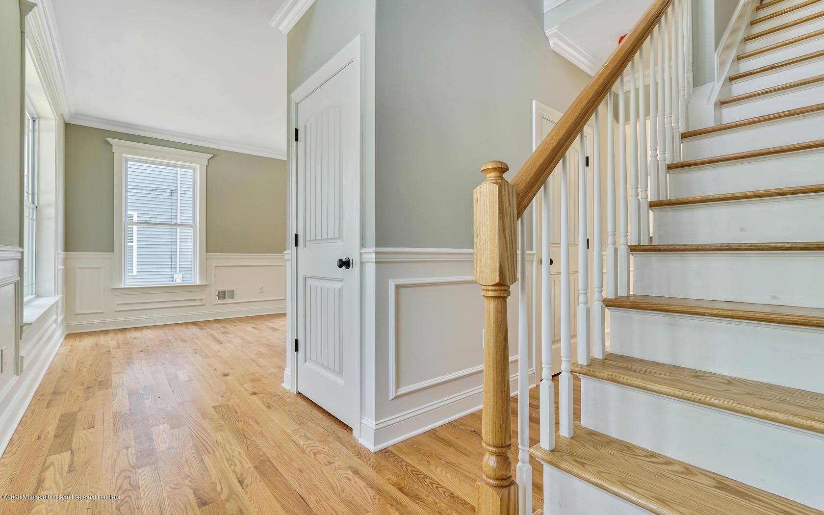 615 Ivanhoe Road Brick, NJ 08723 - Photo 3 of 28 a view of an entryway with wooden floor and door