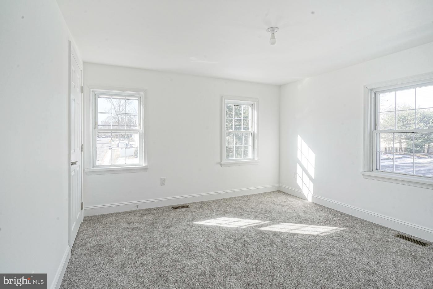 155 Cedar Avenue Pitman, NJ 08071 - Photo 23 of 41 an empty room with windows