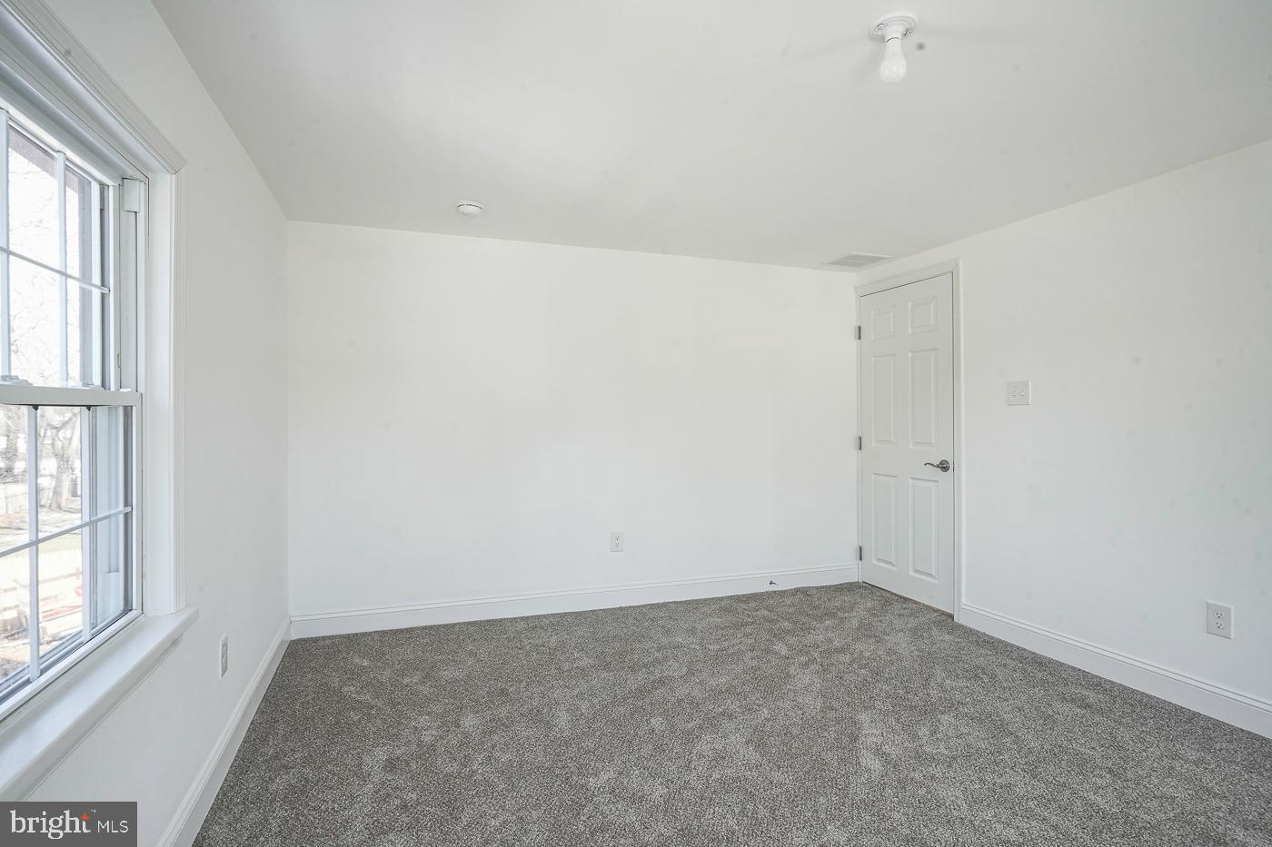 155 Cedar Avenue Pitman, NJ 08071 - Photo 24 of 41 an empty room with windows