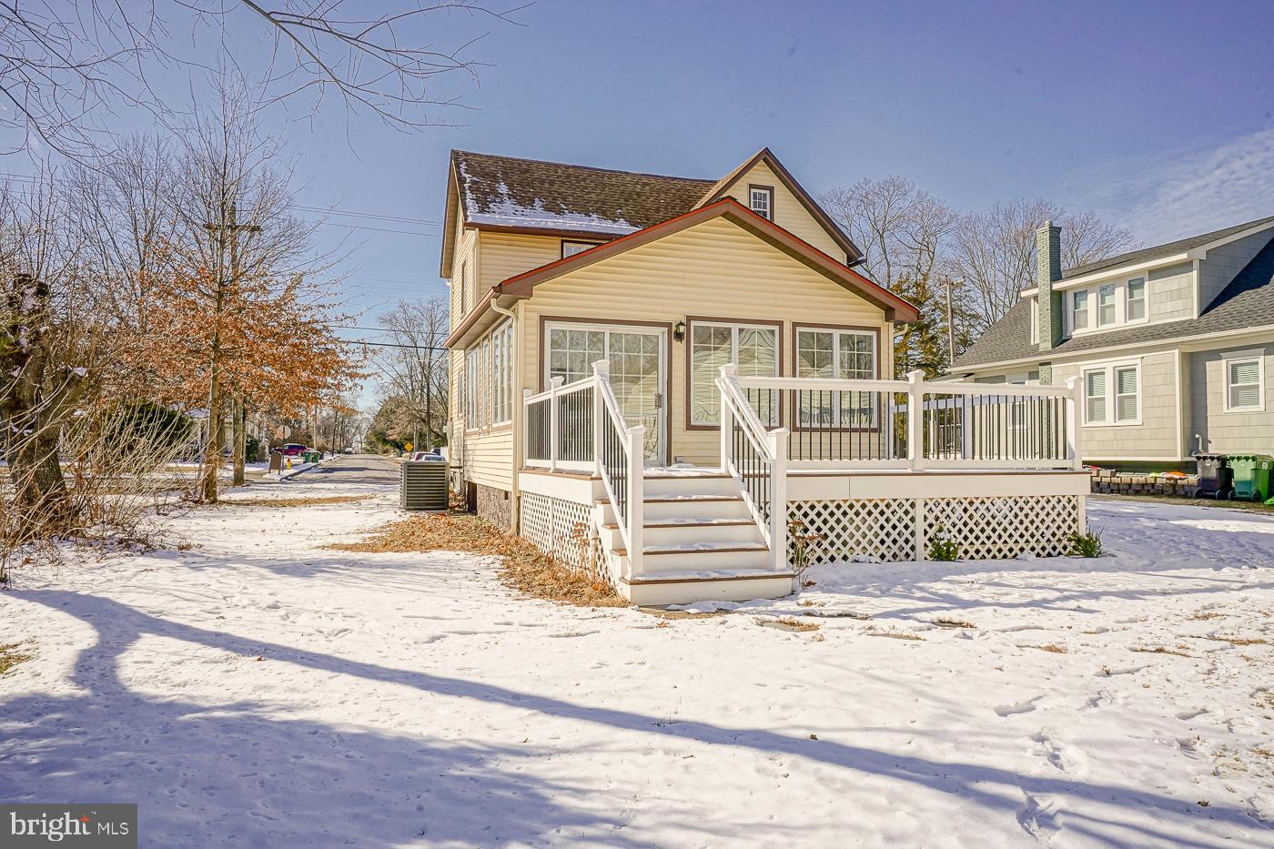 155 Cedar Avenue Pitman, NJ 08071 - Photo 38 of 41 a front view of a house with a yard