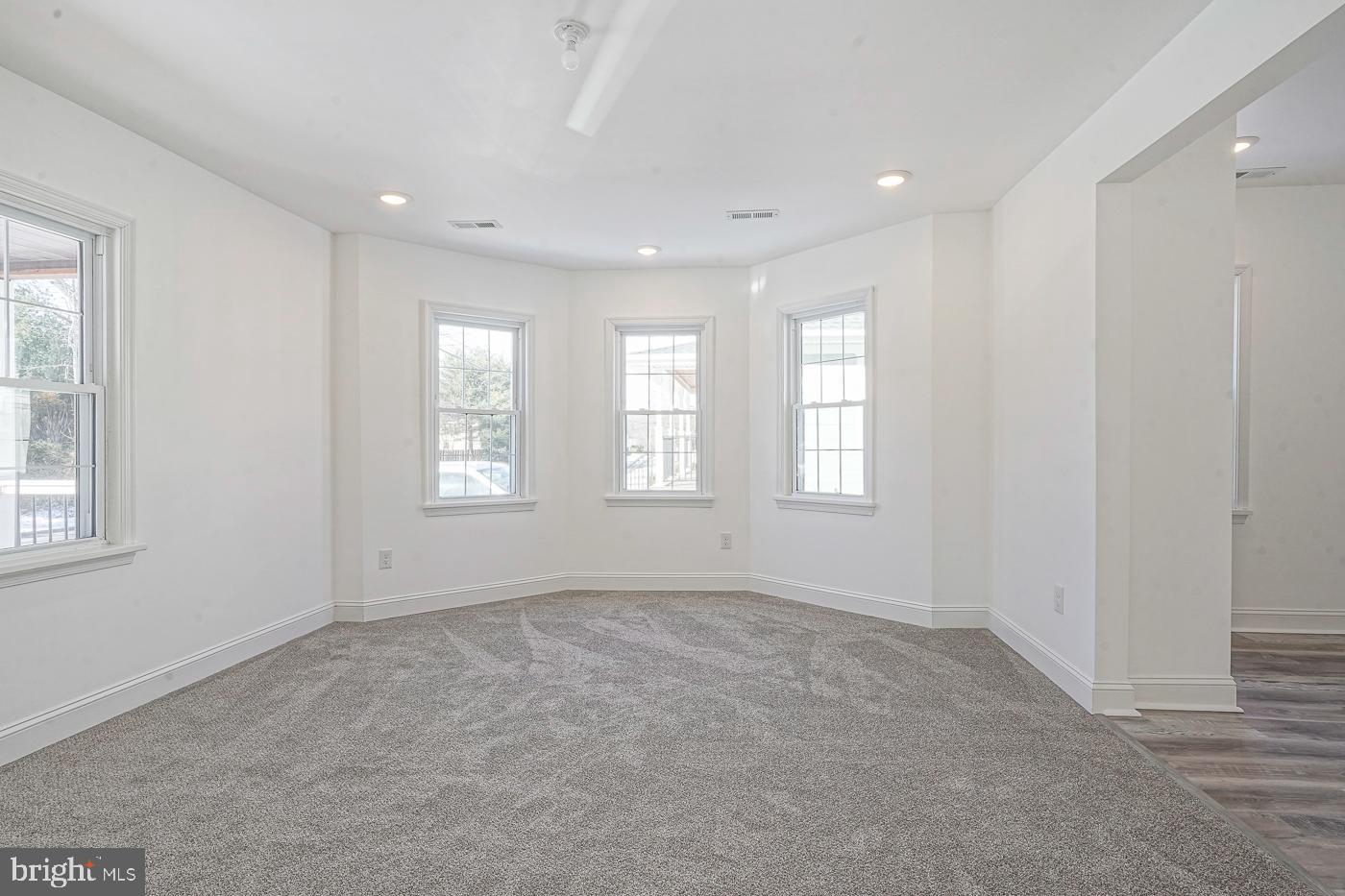 155 Cedar Avenue Pitman, NJ 08071 - Photo 7 of 41 a view of an empty room with a window