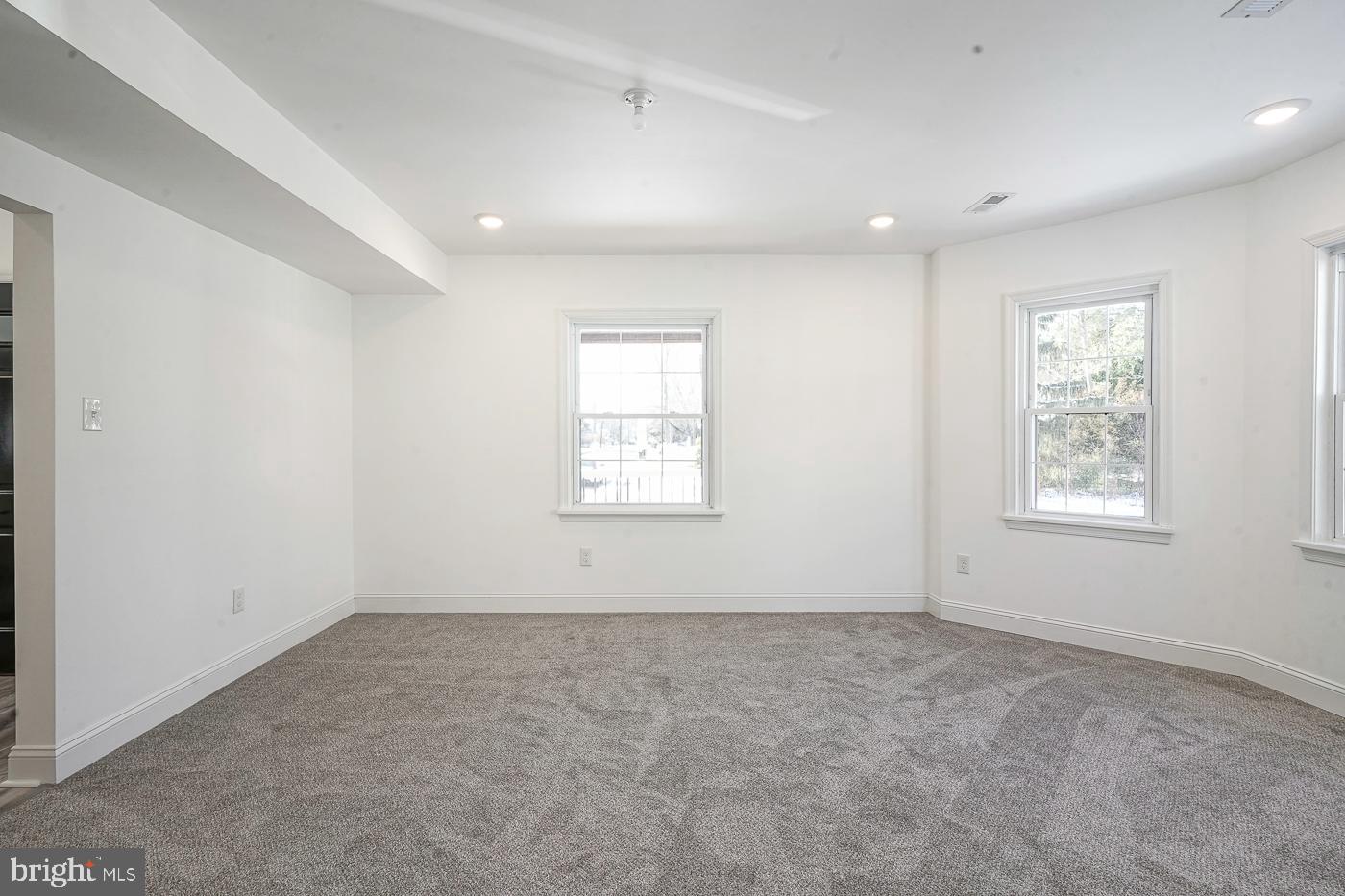 155 Cedar Avenue Pitman, NJ 08071 - Photo 8 of 41 an empty room with windows