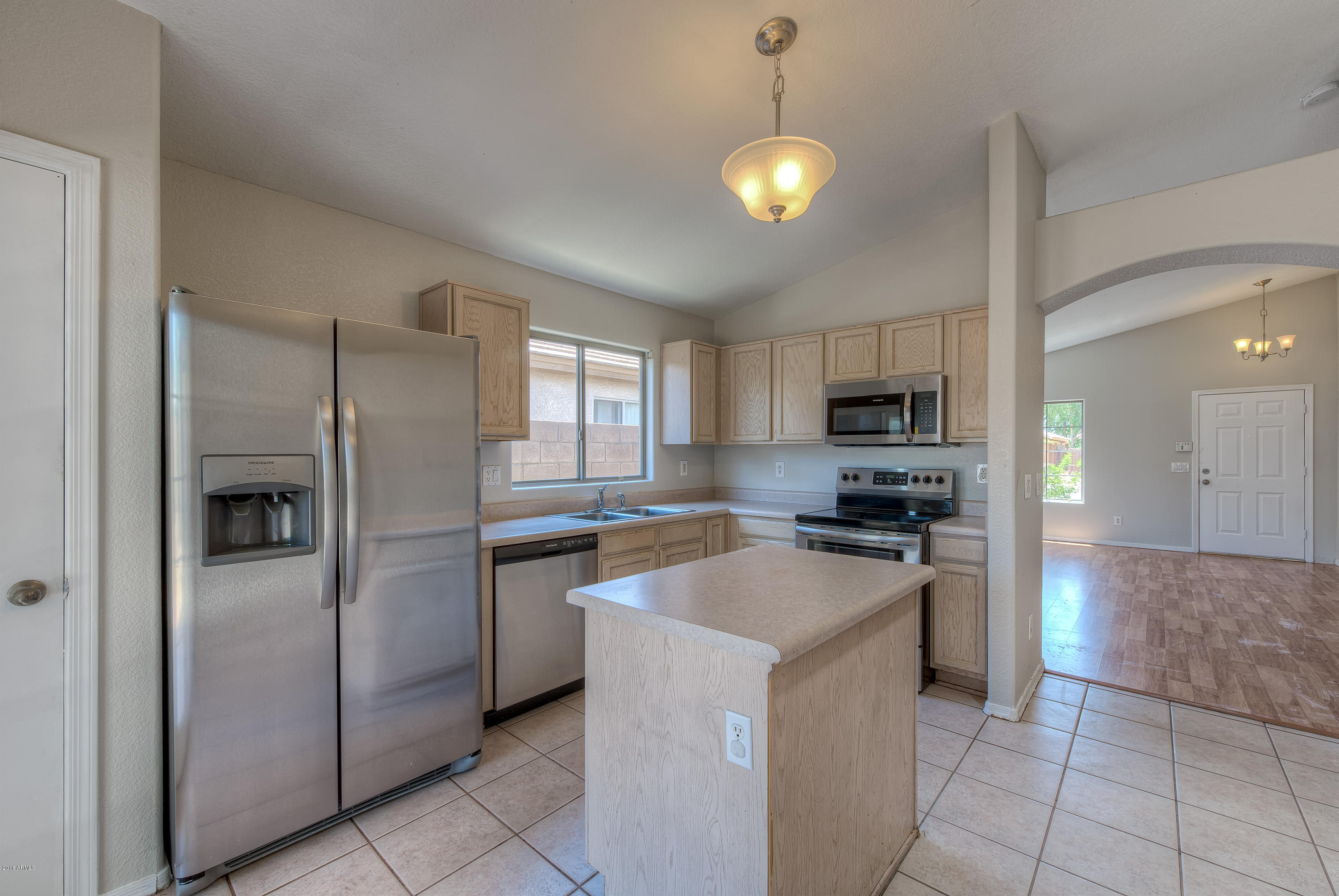 6408 West Cordes Road Phoenix, AZ 85043 - Photo 5 of 20 Kitchen to Living Room
