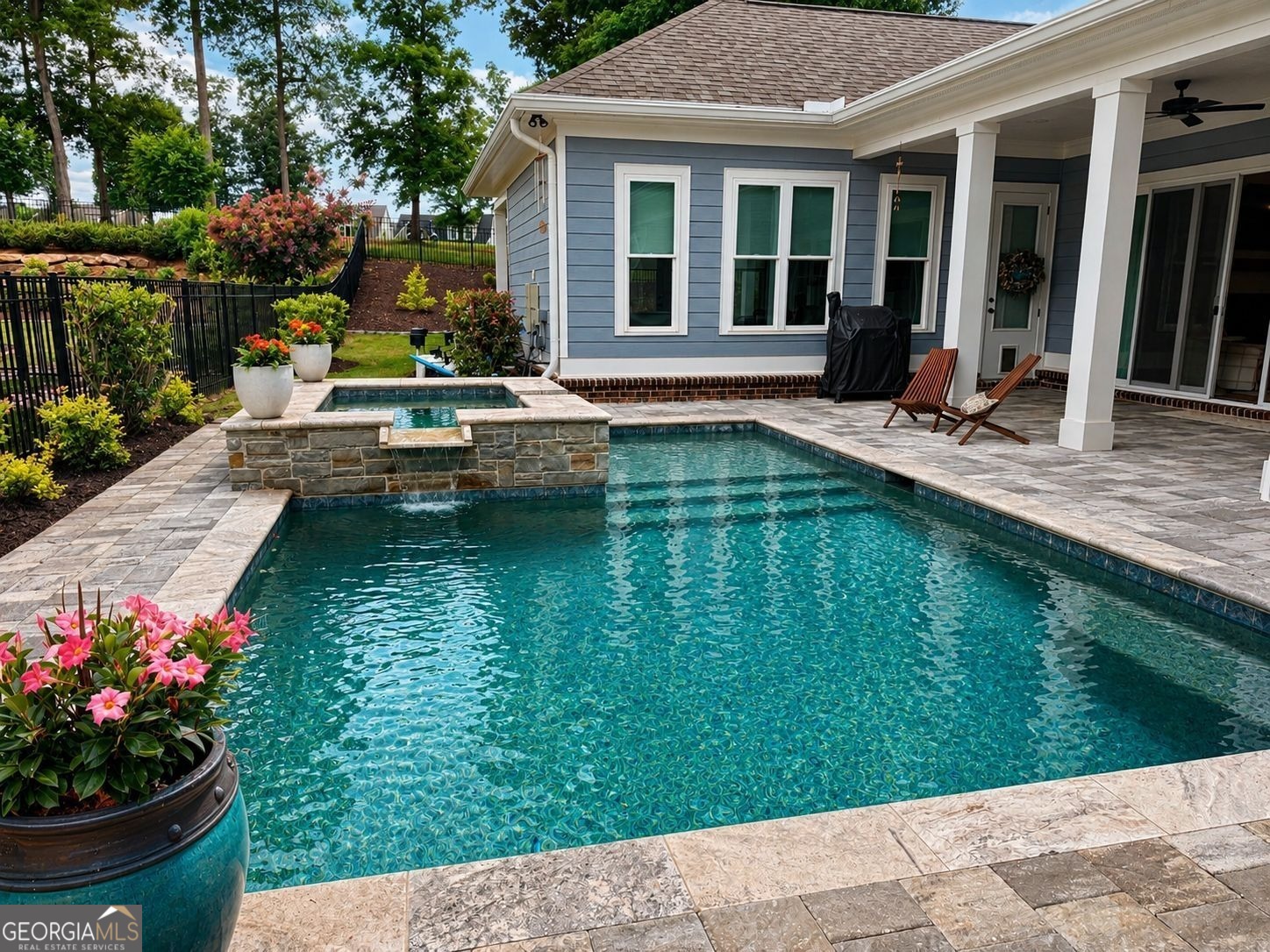 913 Indigo Bunting Road Statham, GA 30666 - Photo 29 of 31 a view of a house with swimming pool and porch with furniture
