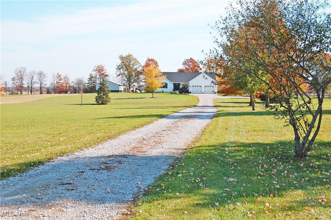 26875 W Road Wellington, OH 44090 - Photo 2 of 26 View of home from down drive