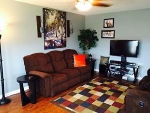 110 Meridians Way Oak Grove, KY 42262 - Photo 3 of 10 a living room with furniture and a flat screen tv