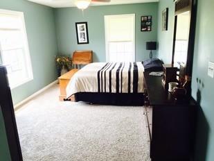 110 Meridians Way Oak Grove, KY 42262 - Photo 4 of 10 a bed sitting in a bedroom next to a window