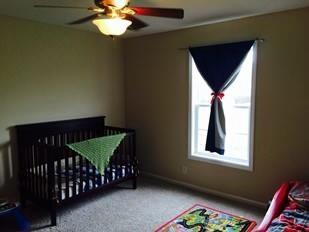 110 Meridians Way Oak Grove, KY 42262 - Photo 7 of 10 a bedroom with a bed and a window