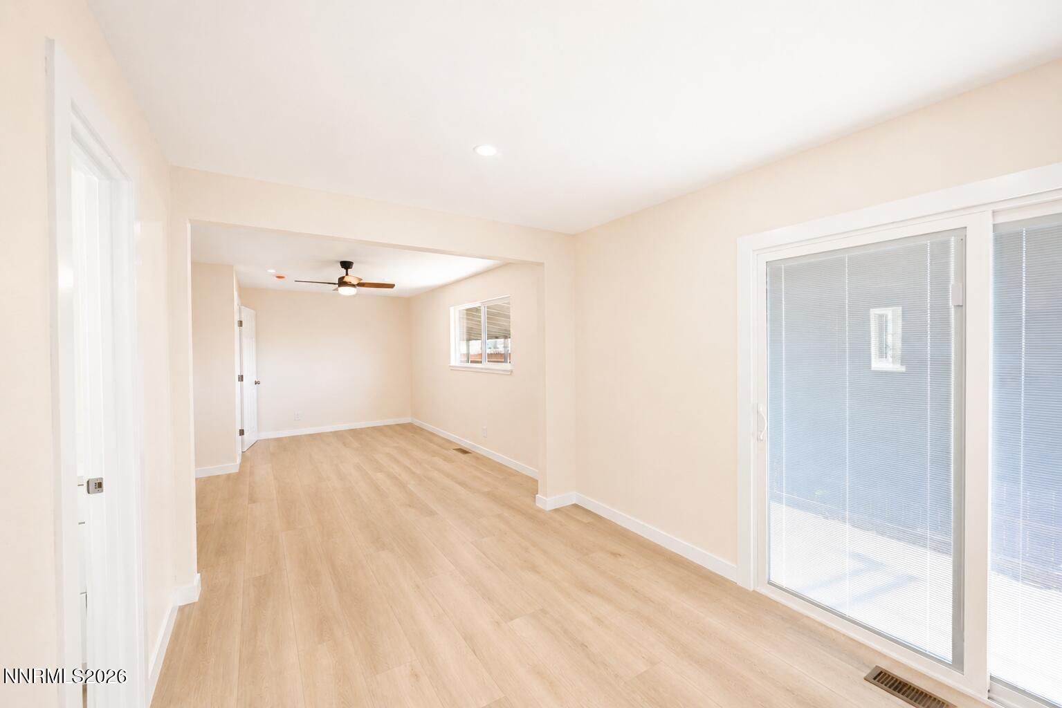 742 Ruth Street Carson City, NV 89701 - Photo 12 of 25 a view of empty room with wooden floor