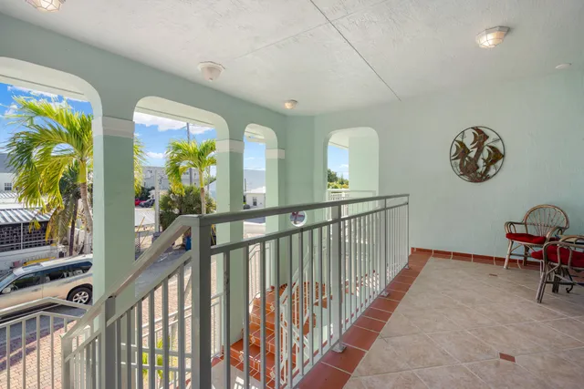 a kitchen with stainless steel appliances kitchen island granite countertop a sink and cabinets