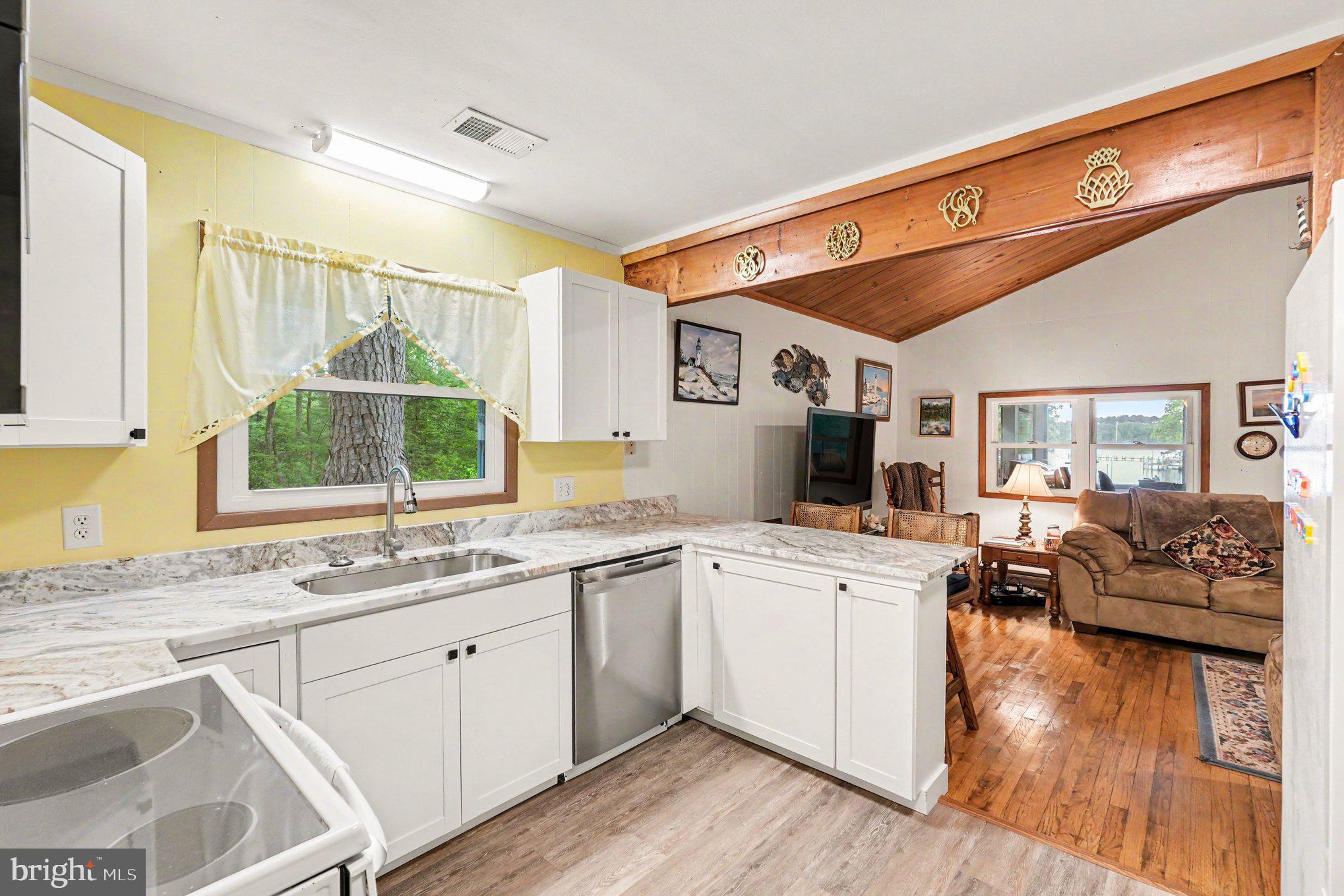 306 Liberty Road Reedville, VA 22539 - Photo 10 of 46 New kitchen cabinets with breakfast bar