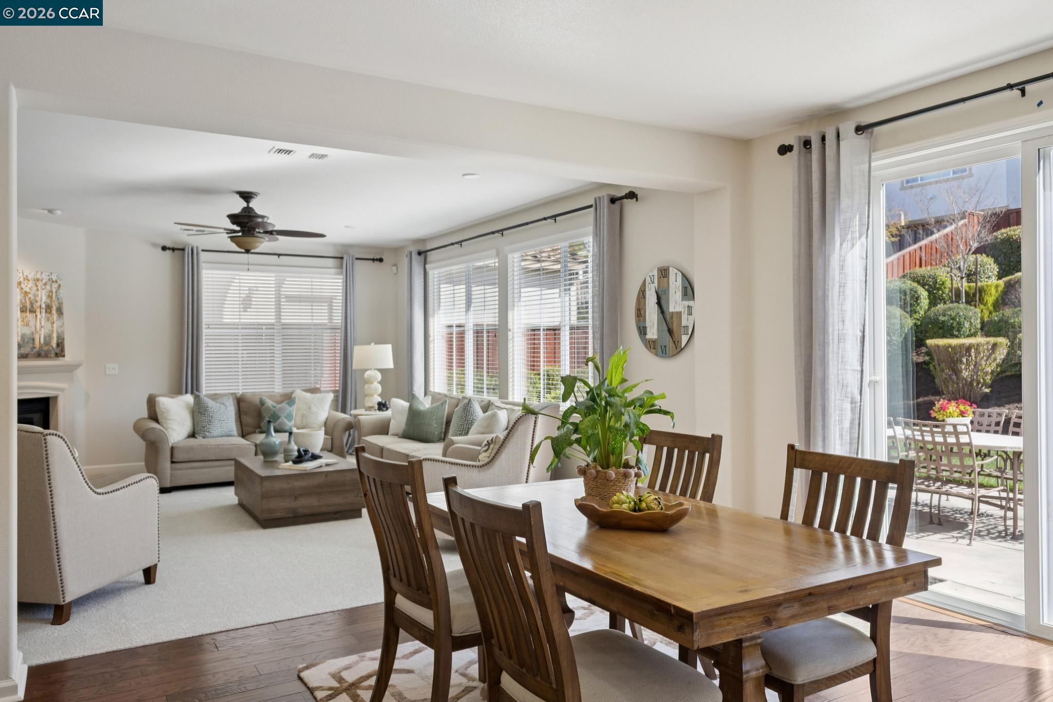 6183 Kearny Way San Ramon, CA 94582 - Photo 16 of 59 a view of a dining room with furniture window and wooden floor