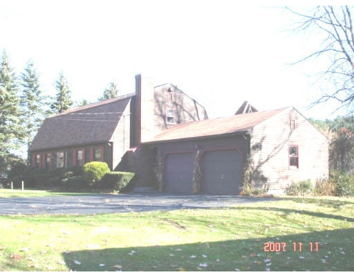a view of a house with a swimming pool