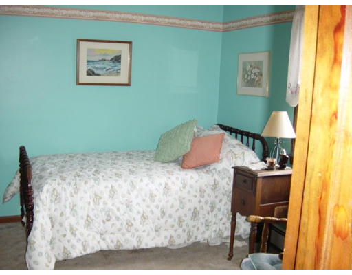 358 W Road Westfield, MA 01085 - Photo 9 of 15 a bedroom with a bed and furniture