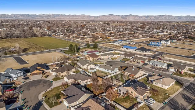 an aerial view of residential houses with outdoor space