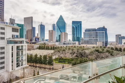 a view of building with yard and staircase