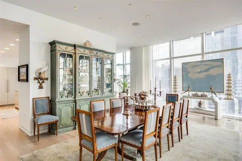 a view of a dining room with furniture window and outside view