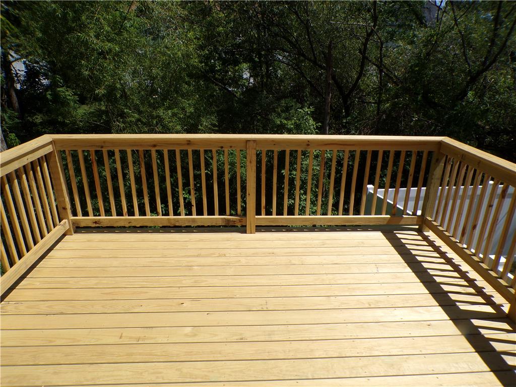 3283 Seip Road Macungie, PA 18062 - Photo 14 of 33 A newly constructed wood deck provides an elevated outdoor retreat with privacy.