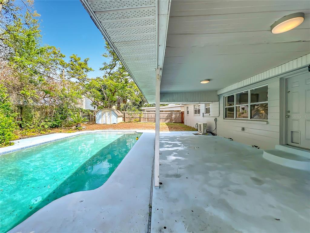 1700 Edmundshire Road Orlando, FL 32812 - Photo 33 of 43 a view of a back yard of the house