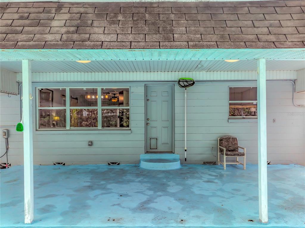 1700 Edmundshire Road Orlando, FL 32812 - Photo 35 of 43 a front view of a house with a yard