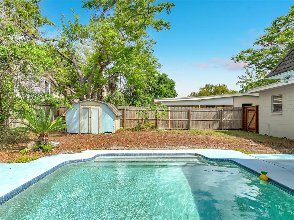 1700 Edmundshire Road Orlando, FL 32812 - Photo 36 of 43 a view of back yard of the house